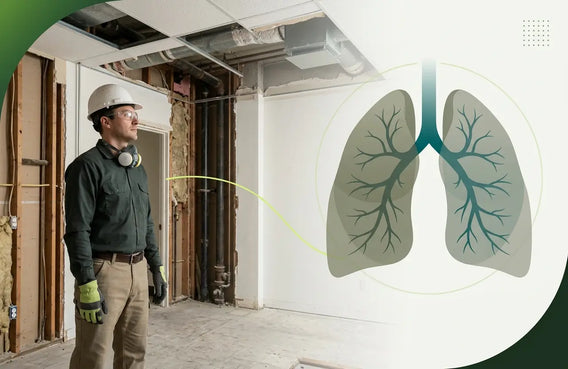 Canadian worker inspecting an older building with a lung graphic representing asbestos-related health risks