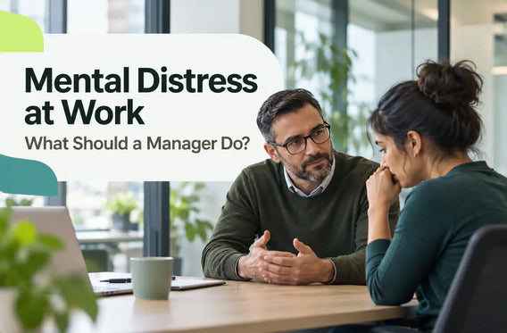 Manager speaking privately with an employee showing signs of mental distress at work.