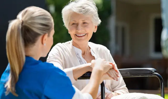 Domiciliary Care Support Worker providing compassionate home care and emotional support to an elderly woman
