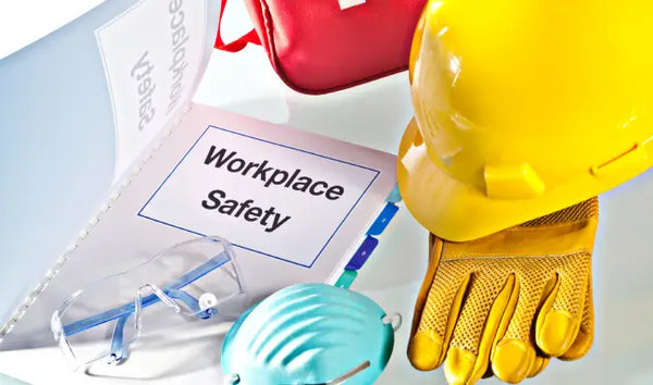 Level 2 workplace health and safety training manual with PPE including hard hat, safety glasses, gloves, and face mask.